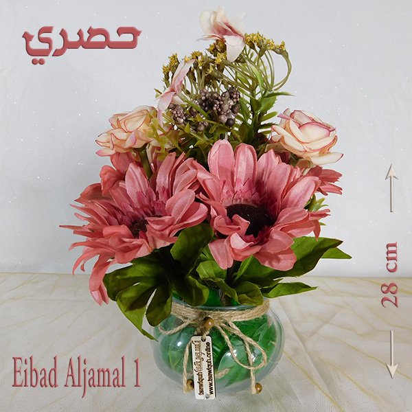 Glass bowl artificial flowers with mixed roses and gerberas in clear vase