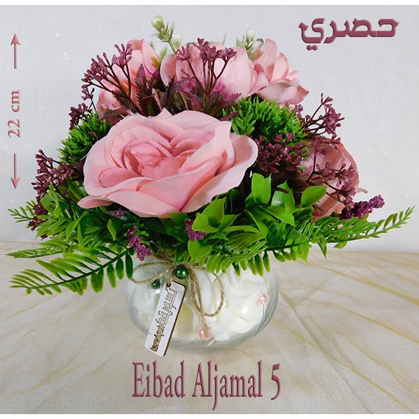 Glass bowl artificial flowers with mixed roses and gerberas in clear vase