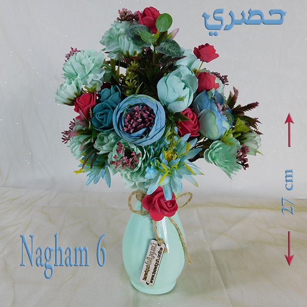 Mixed flower centerpiece with pink roses in Egyptian ceramic vase, 11 designs available