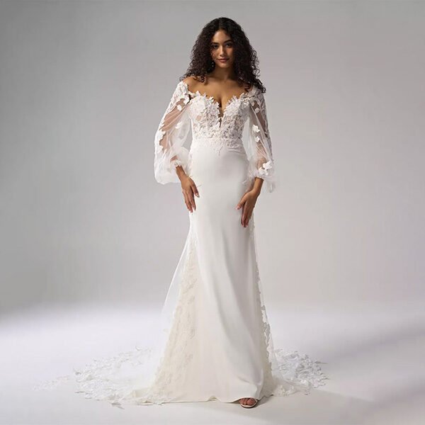 Long sleeve tulle mermaid wedding dress in ivory with chapel train