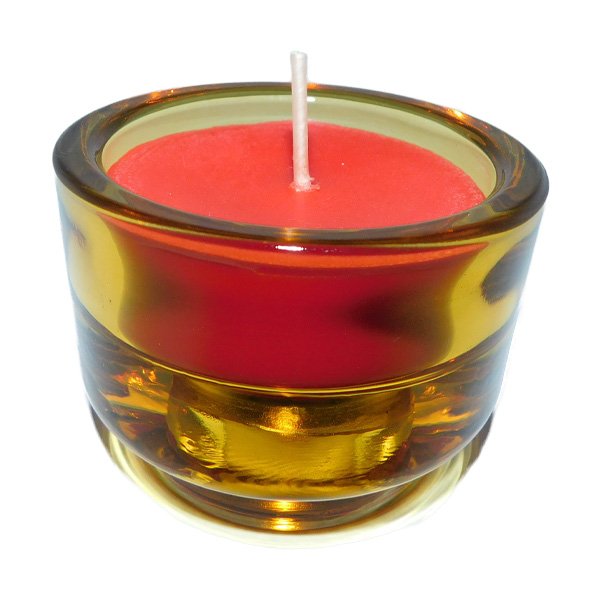 Scented candle in glass with multi-color holders and essential oils