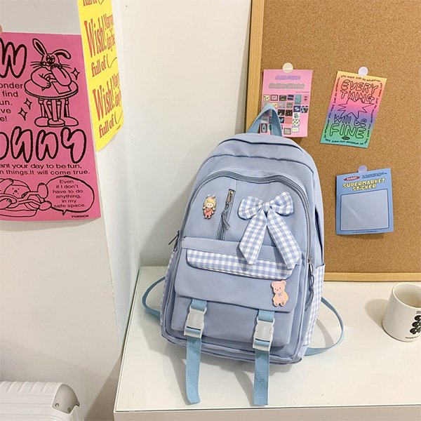 School Backpack with bow tie and plush pendant
