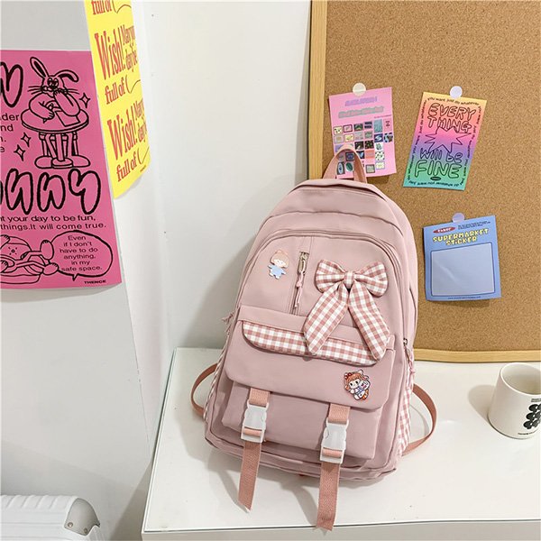 School Backpack with bow tie and plush pendant