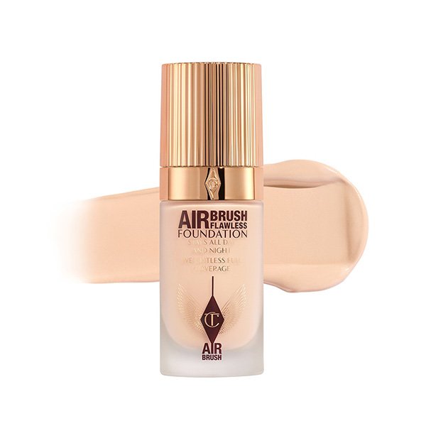 Long Lasting Foundation rose gold ribbed cap with natural matte formula smear