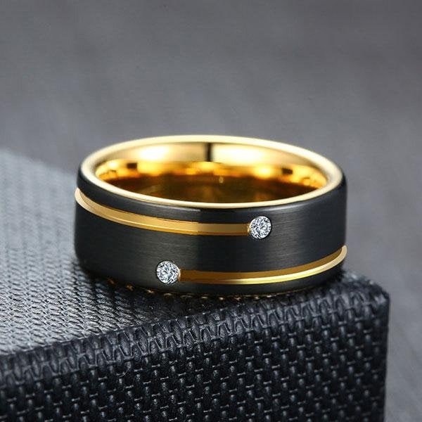Mens Wedding Ring Italo two-tone sapphire band displayed on textured black gift box