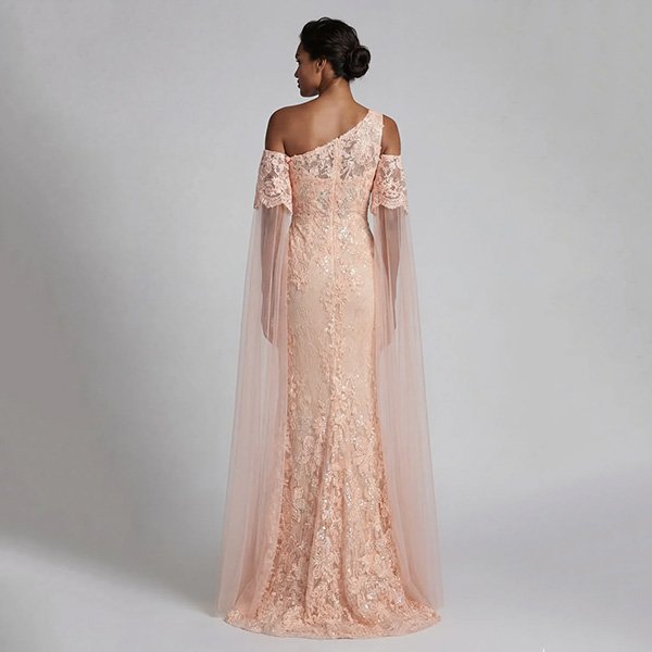 Mermaid Gown Zapaka peach back view showing one-shoulder lace and floor-length cape