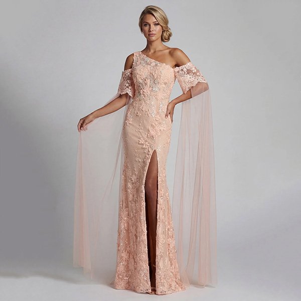 Mermaid Gown Zapaka peach sparkly beaded gown with cape held open by model