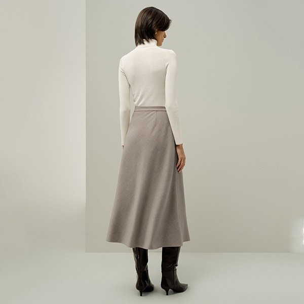 Midi Skirt LILYSILK mottled silk-wool taupe rear view with cream turtleneck and dark knee-high boots