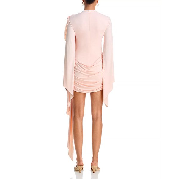 De La Vali Perisa mini dress in baby pink with pleated draped shoulder and asymmetric cuffs