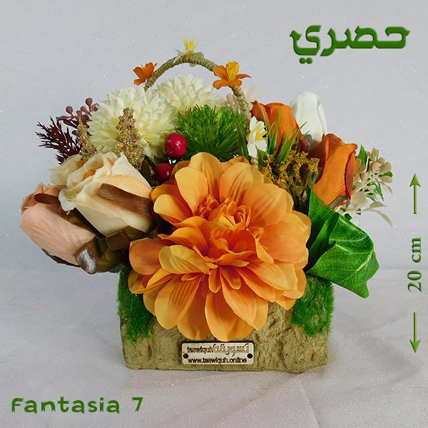 Fantasia bouquet in artisan pottery vase with imported blooms and nigella finish