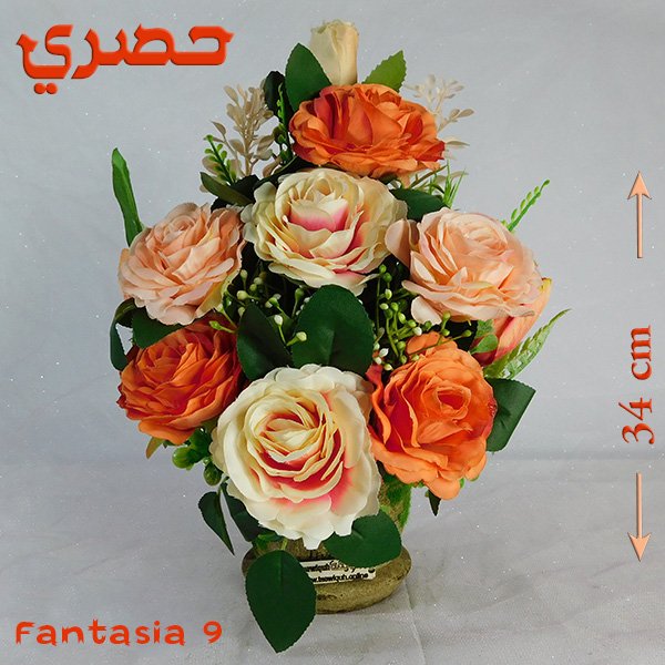 Fantasia bouquet in artisan pottery vase with imported blooms and nigella finish