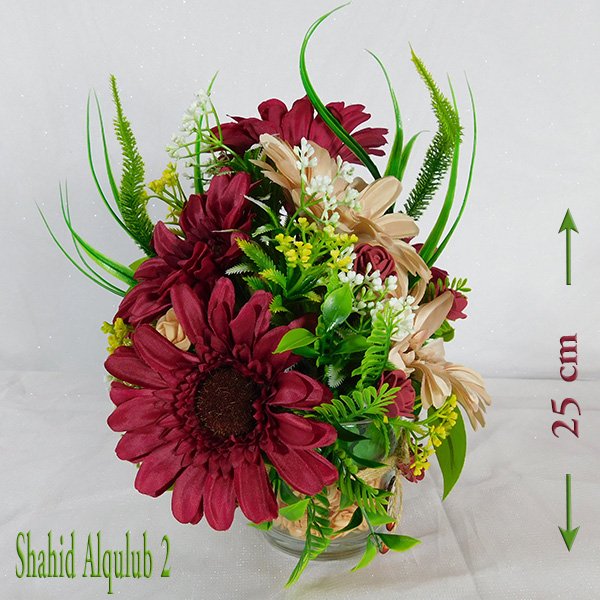 Shahid Alqulub sunflower bouquet in small glass vase with imported blooms and variable design options