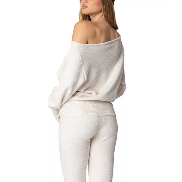 Cream oversized sweater back view with relaxed asymmetric design