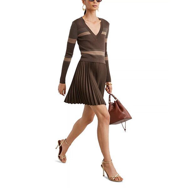 Knit Dress REISS Carly Chocolate walking side view with pleated skirt and striped bodice