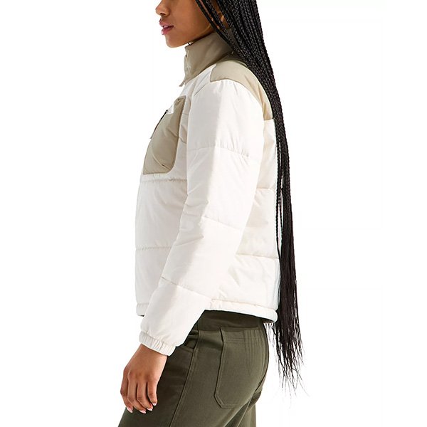 White insulated jacket side view showing elasticized cuffs and relaxed fit