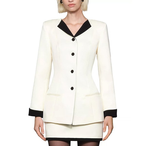 Cream and black tailored suit set front view showing contrast lapels and button closures