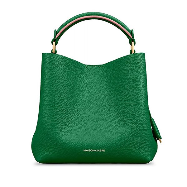 Emerald Lily mini bucket bag showing green leather with pink contrast handle and adjustable strap