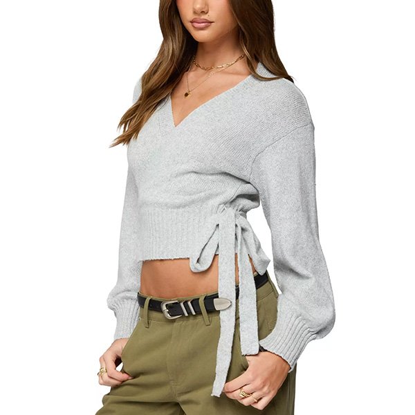 Gray wrap cardigan side view with tie detail and fitted silhouette