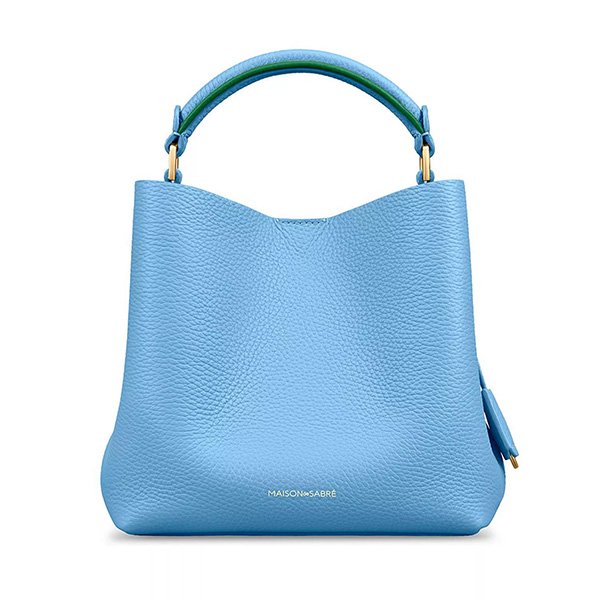 Sky Emerald mini bucket bag showing blue leather with green contrast handle and DriTan leather texture