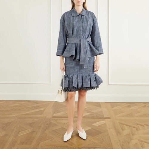 Ruffled Skirt Jacquemus grey styled with matching denim jacket and white pointed mules
